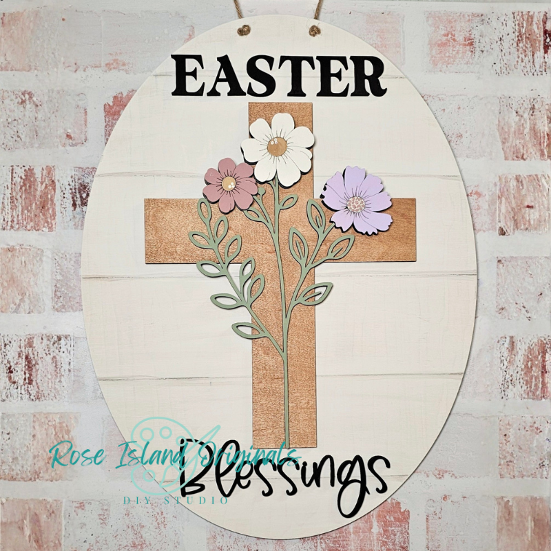 Decorative sign with cross, flowers, and 'Easter Blessings' text on a rustic background.