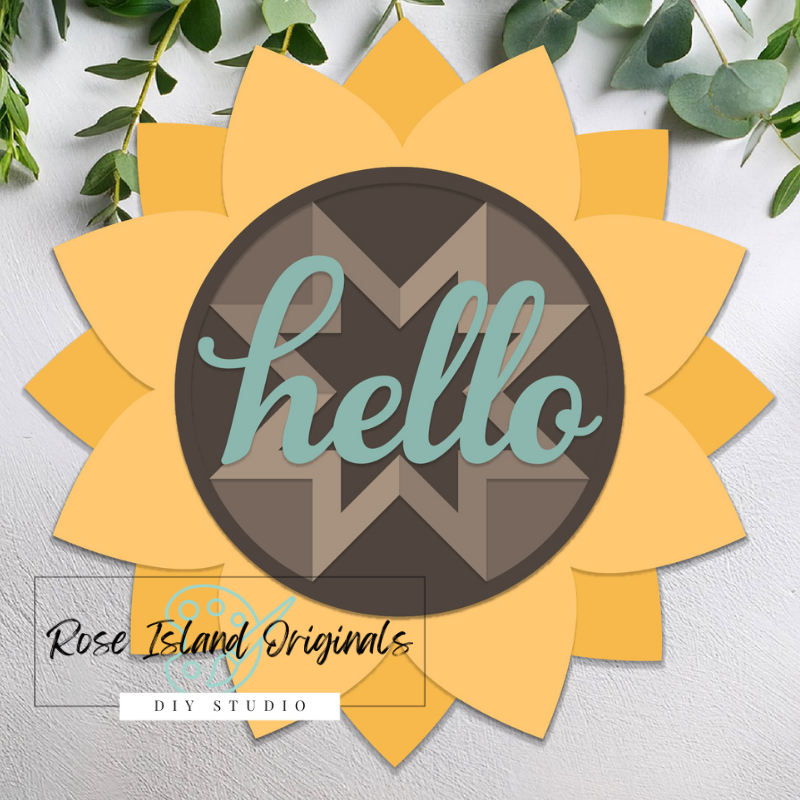 Decorative sunflower-shaped sign with 'hello' text and Rose Island Originals branding on a light background.