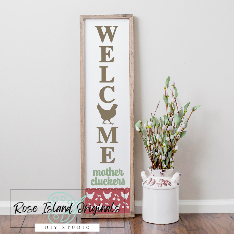 Wood sign with welcome mother cluckers and chicken design