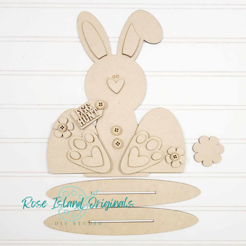 Wooden bunny craft kit with decorative elements on a white background, branded 'Rose Island Originals'.