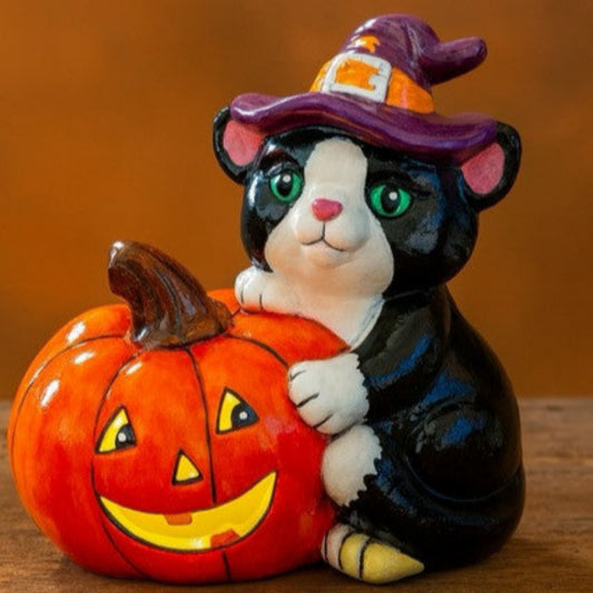 Ceramic Cat holding Jack O Lantern