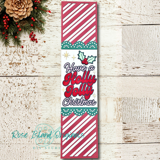 Christmas-themed decorative wood sign with text and patterns on a wooden surface.