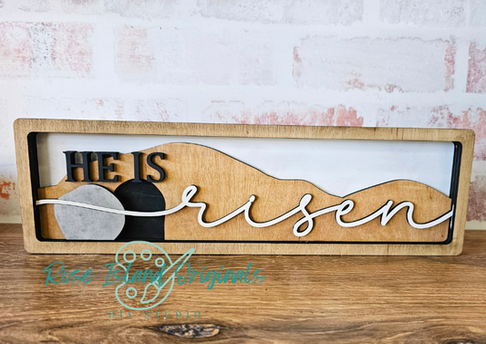 Wooden sign with 'He is Risen' text on a rustic background