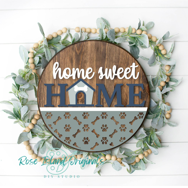 Wood door hanger with dog house and paw prints words home sweet home