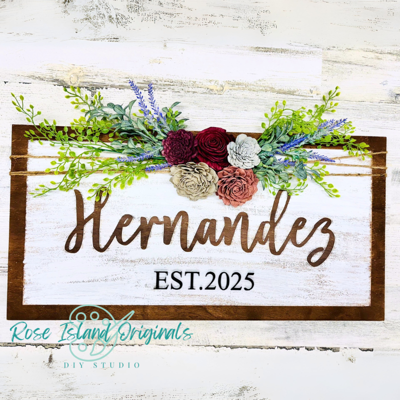 Decorative wood sign personalized with last name and EST year with optional floral design.