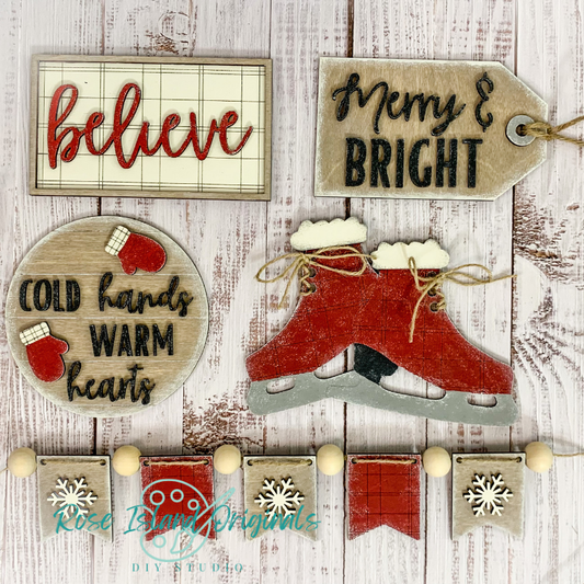Set of Christmas-themed wooden signs on a rustic wooden background