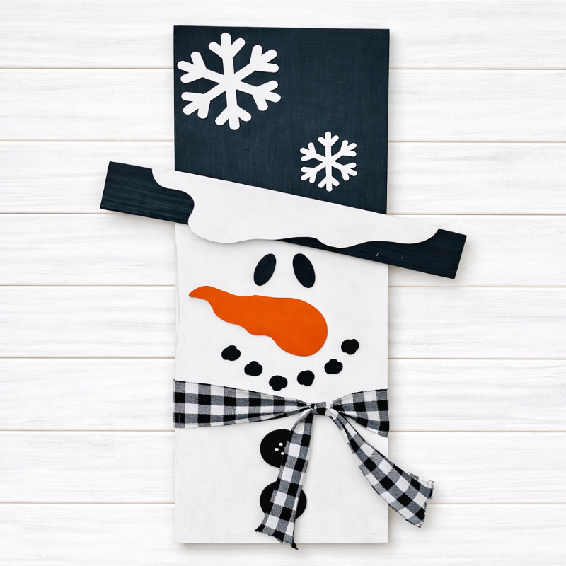 Tall rustic wooden snowman.