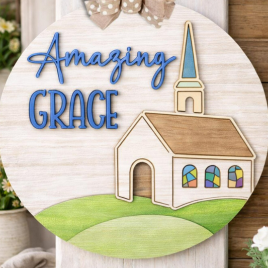 Decorative sign with a church illustration and 'Amazing Grace' text on a wooden background.