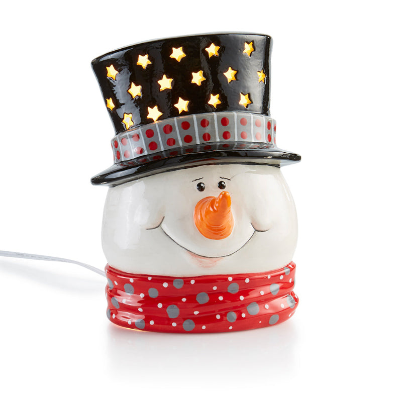 Snowman-shaped lamp with a top hat and red polka dot scarf on a white background