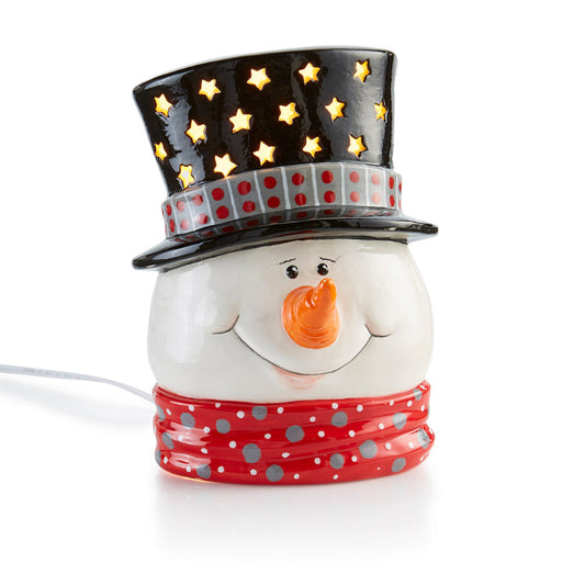 Snowman-shaped lamp with a top hat and red polka dot scarf on a white background